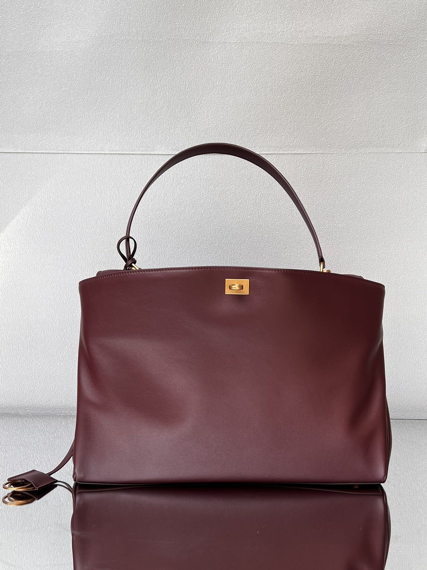 BALENCIAGA Rodeo Large Handbag in Burgundy/Gold Hardware