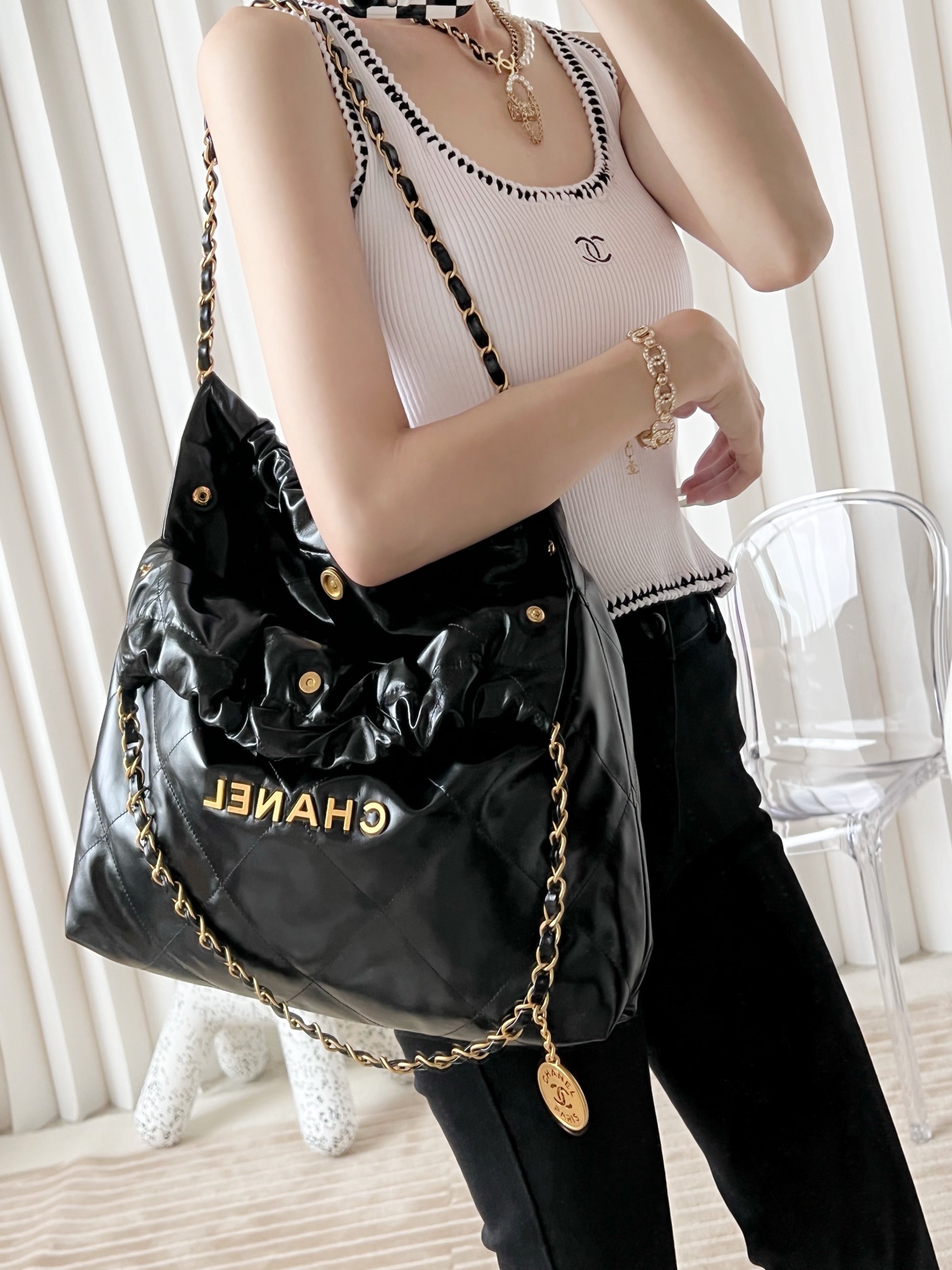 CHANEL Medium 22 Bag Black Calfskin Gold Hardware