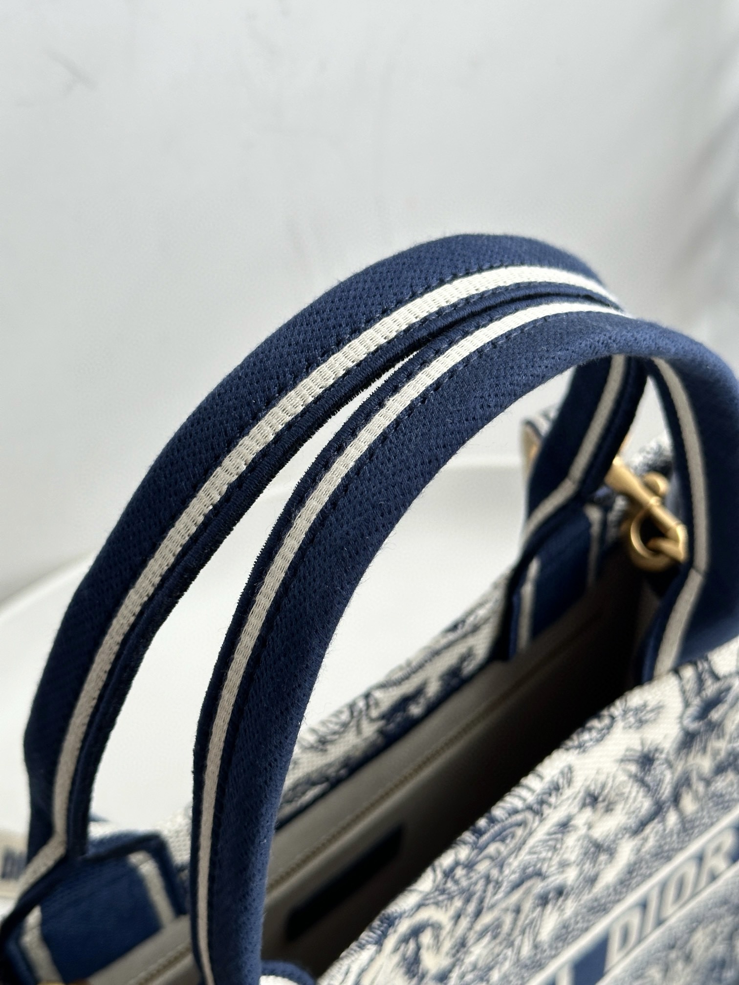 DIOR Medium Dior Book Tote White and Navy Blue Toile de Jouy Sauvage Embroidery with Navy Blue Calfskin