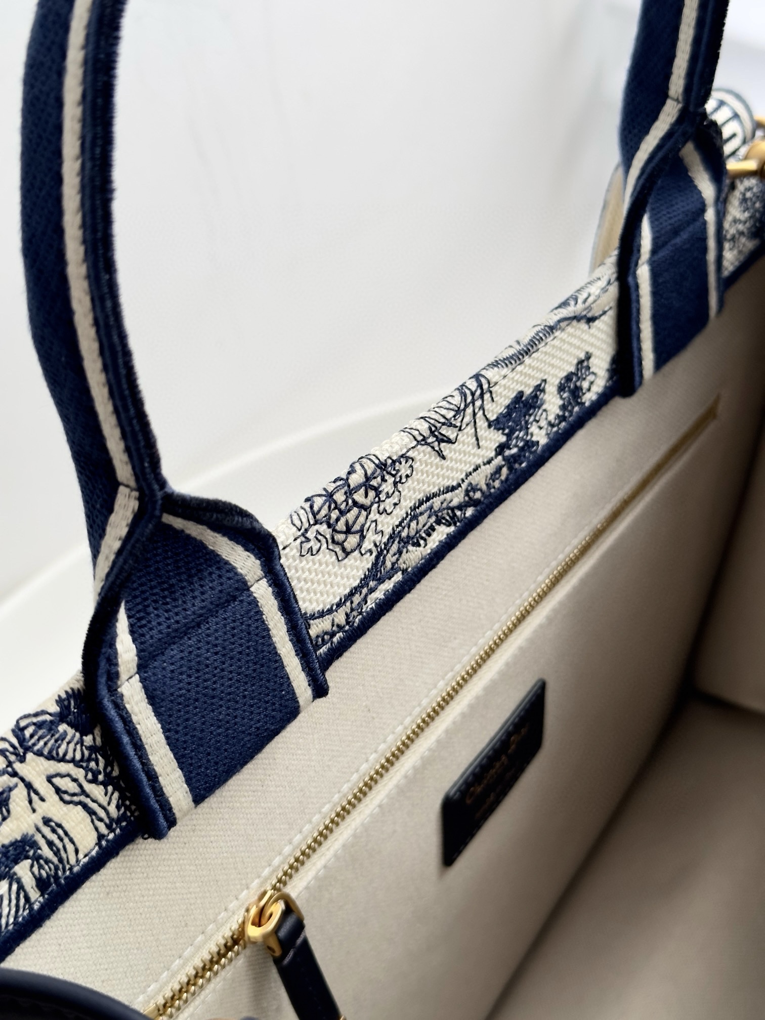 DIOR Medium Dior Book Tote White and Navy Blue Toile de Jouy Sauvage Embroidery with Navy Blue Calfskin