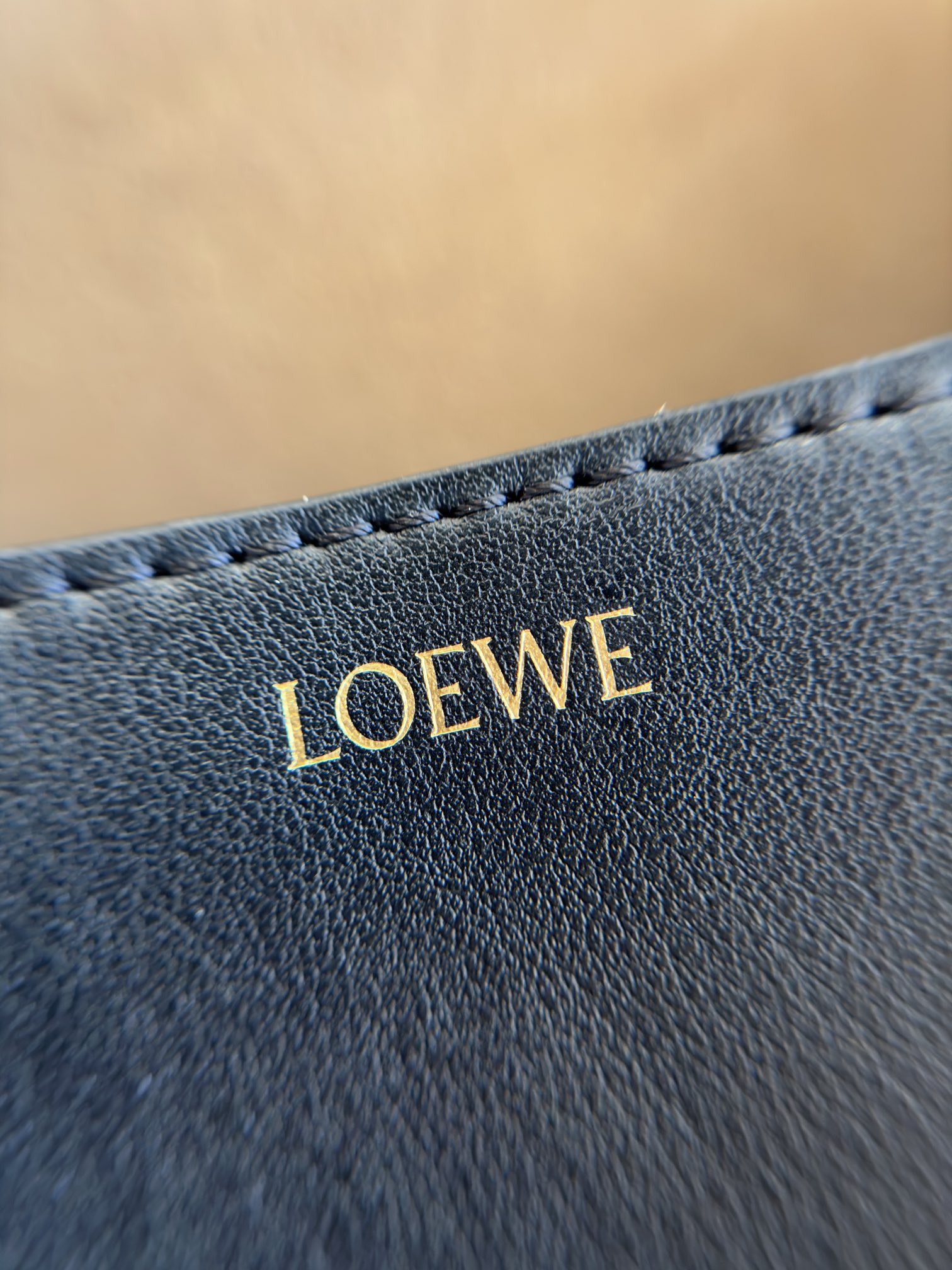 LOEWE Mini Puzzle Fold tote in shiny calfskin Black