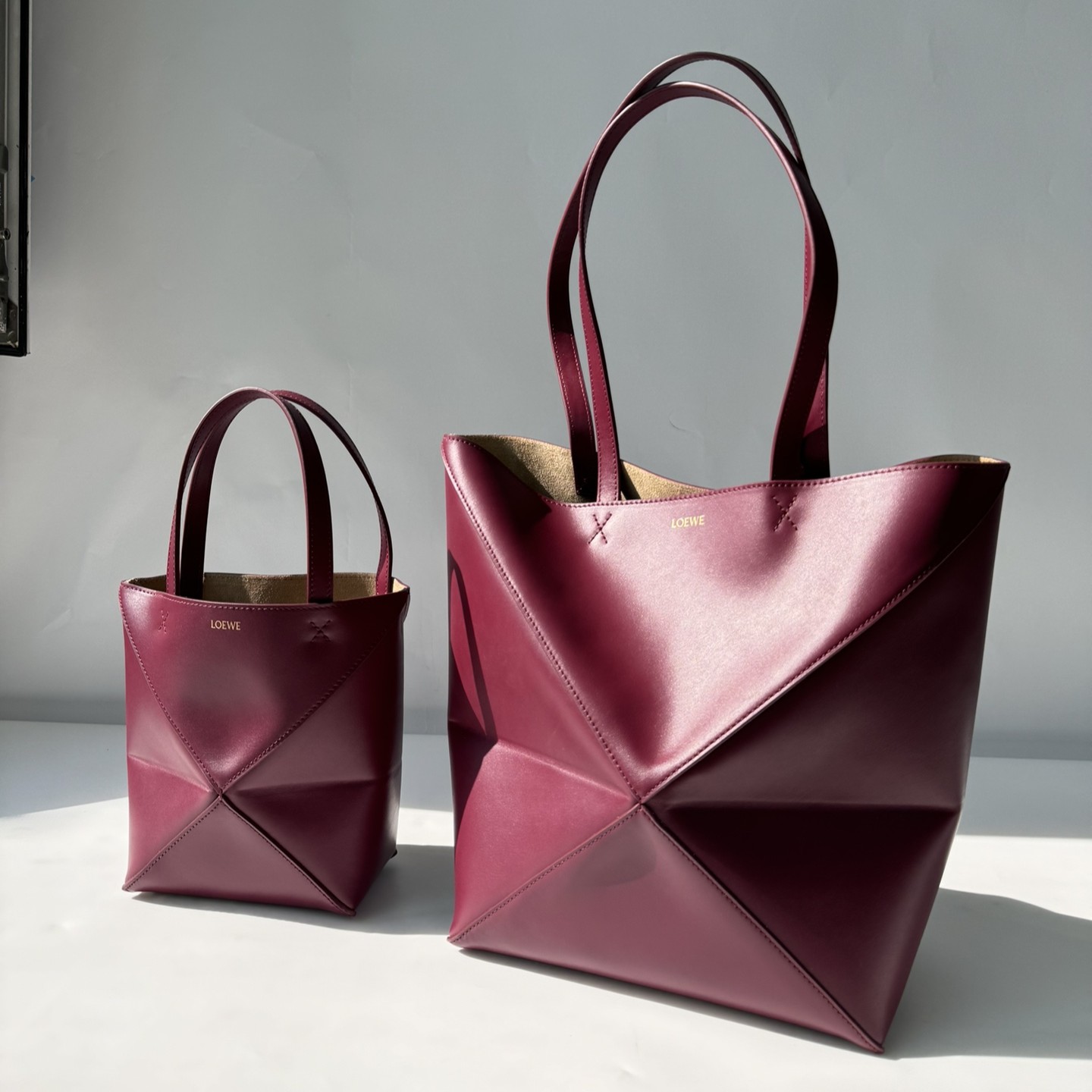 LOEWE Mini/Medium Puzzle Fold tote in shiny calfskin Dark Burgundy