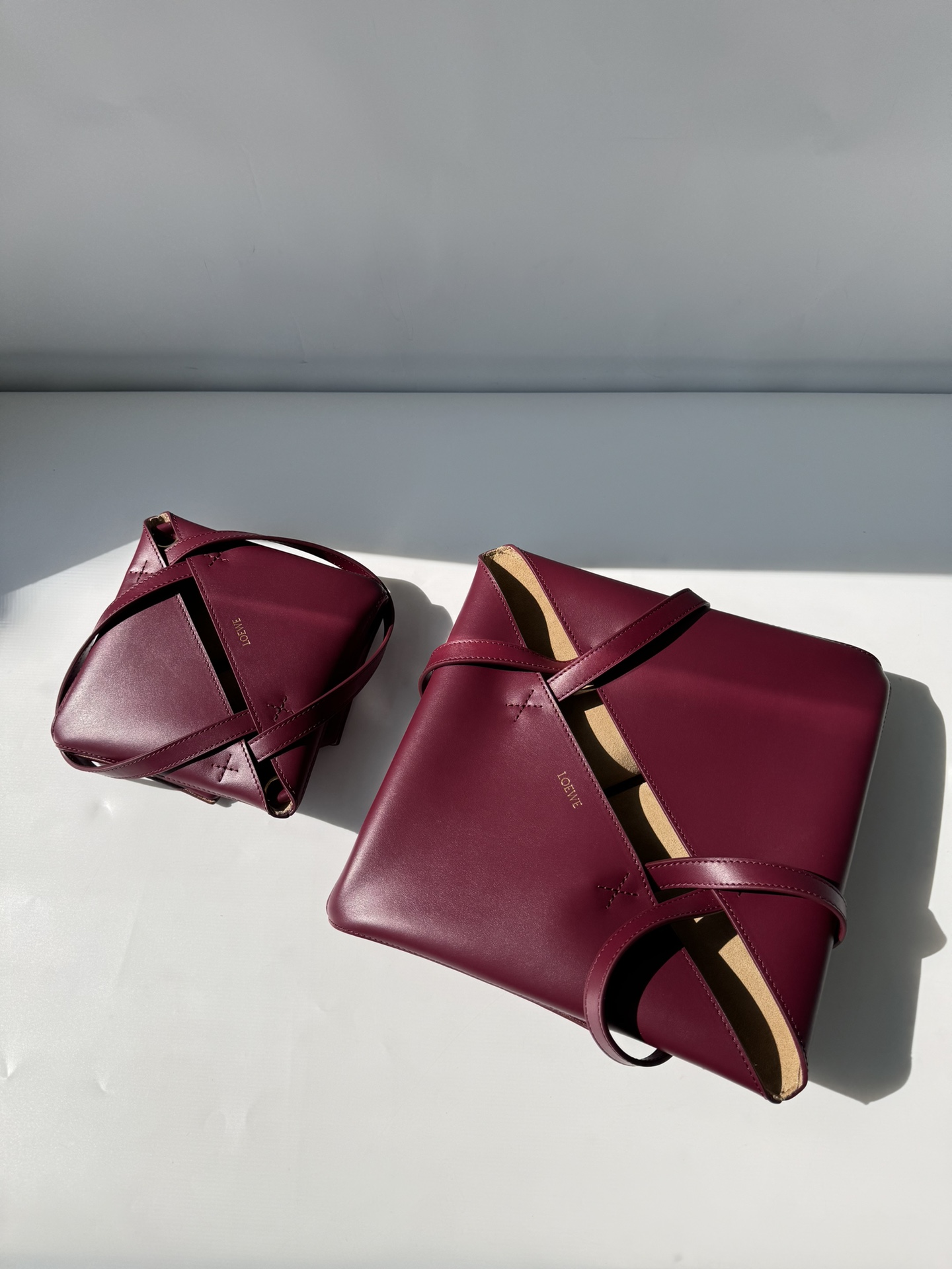 LOEWE Mini/Medium Puzzle Fold tote in shiny calfskin Dark Burgundy