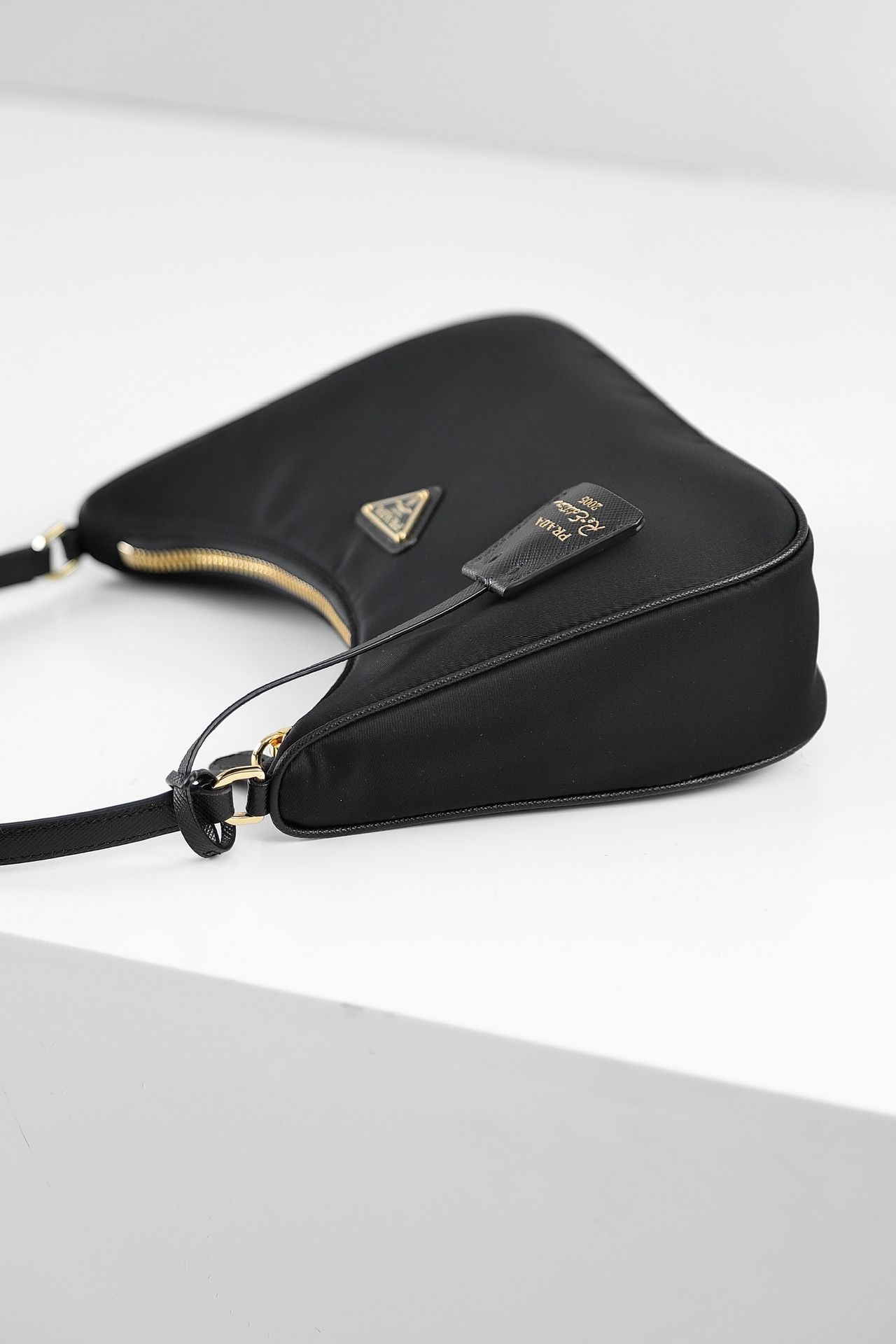 PRADA Re-Edition 2005 Re-Nylon and Saffiano mini bag Black/Gold Hardware