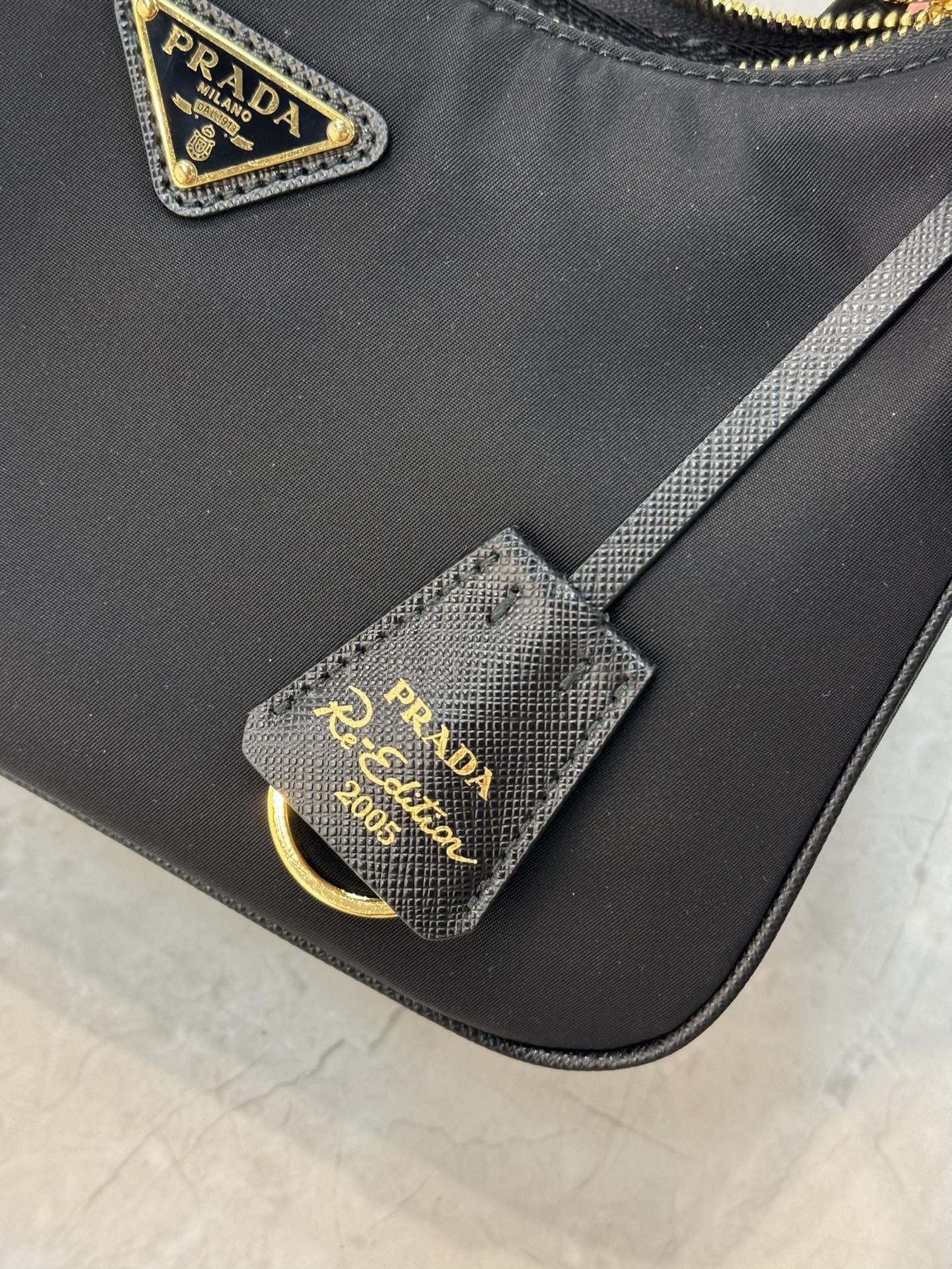 PRADA Re-Edition 2005 Re-Nylon and Saffiano mini bag Black/Gold Hardware