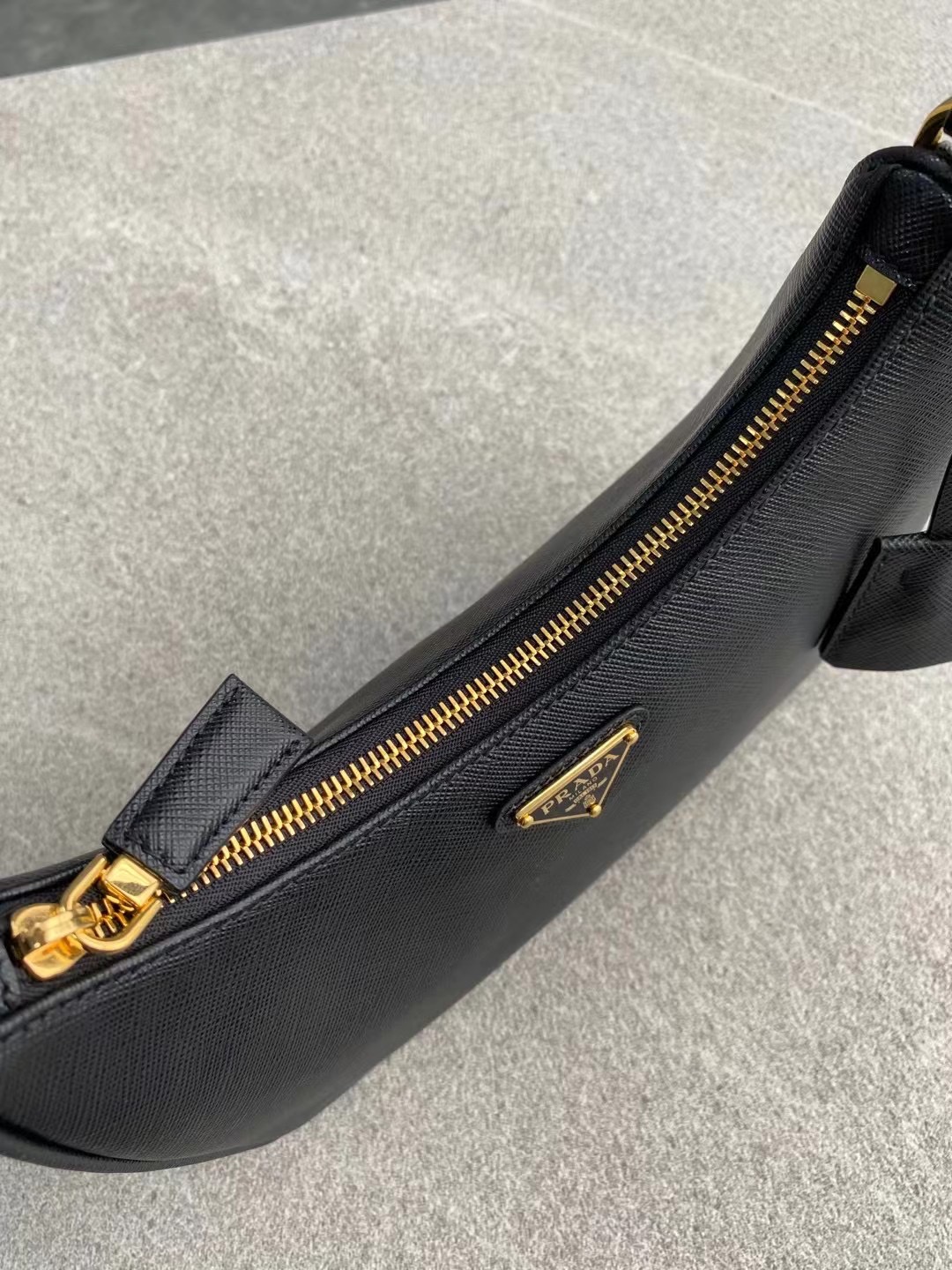 PRADA Re-Edition Saffiano leather mini bag Black/Gold Hardware