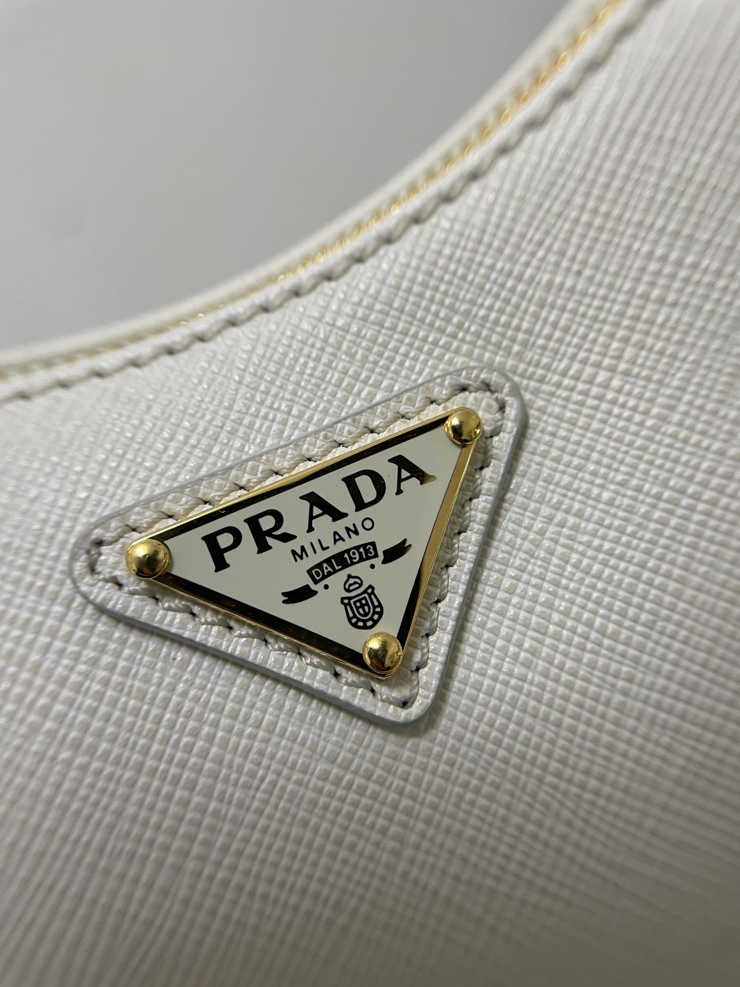 PRADA Re-Edition Saffiano leather mini bag White/Gold Hardware