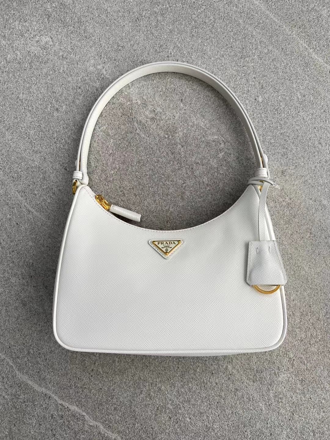 PRADA Re-Edition Saffiano leather mini bag White/Gold Hardware