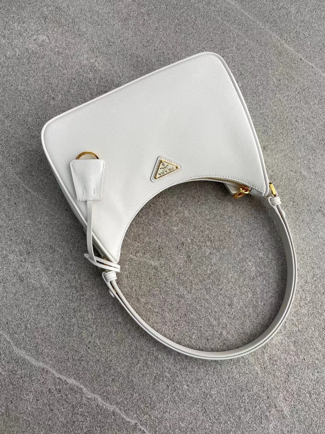 PRADA Re-Edition Saffiano leather mini bag White/Gold Hardware