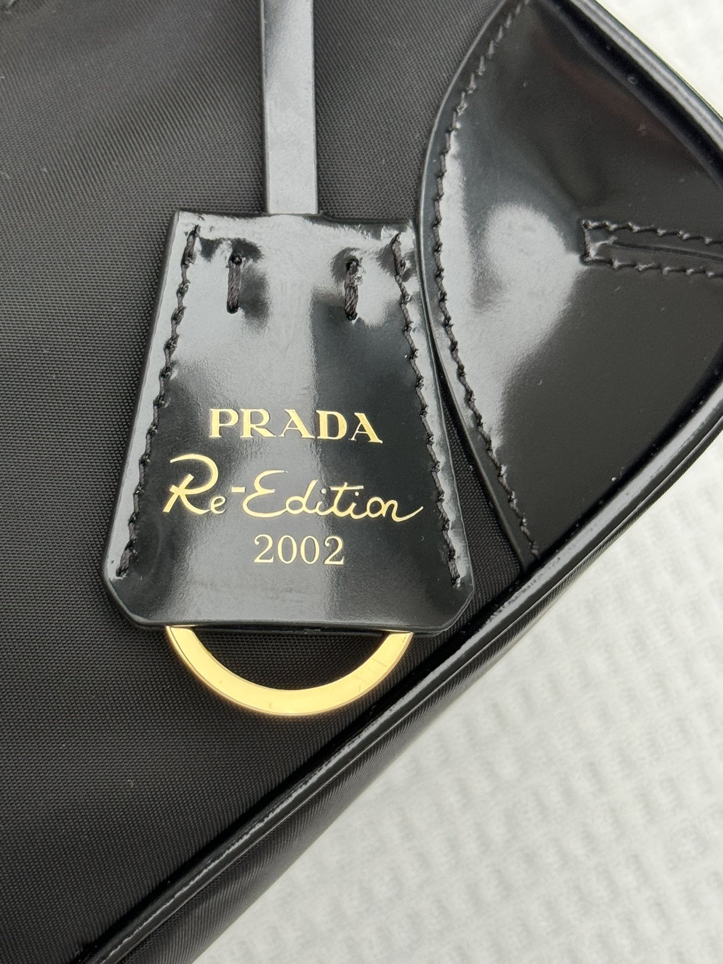 PRADA Re-Edition 2002 Re-Nylon and brushed leather shoulder bag Black/Gold Hardware