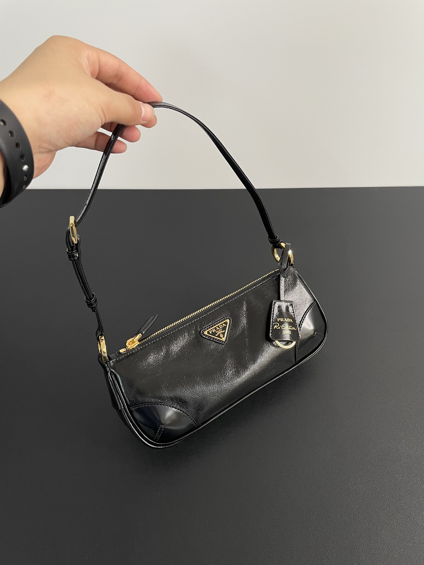 PRADA Re-Edition 2002 small leather shoulder bag Black/Gold Hardware