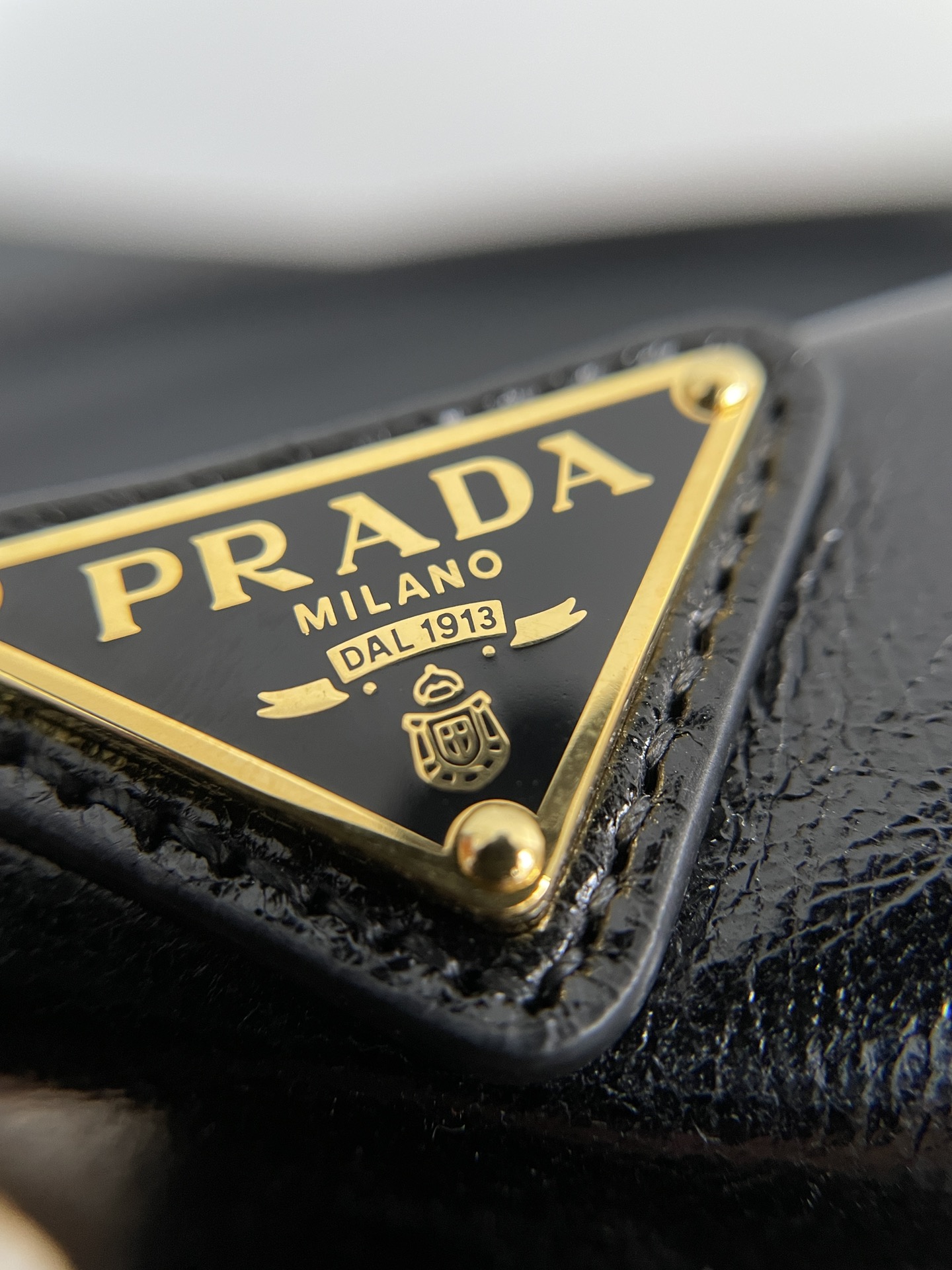 PRADA Re-Edition 2002 small leather shoulder bag Black/Gold Hardware