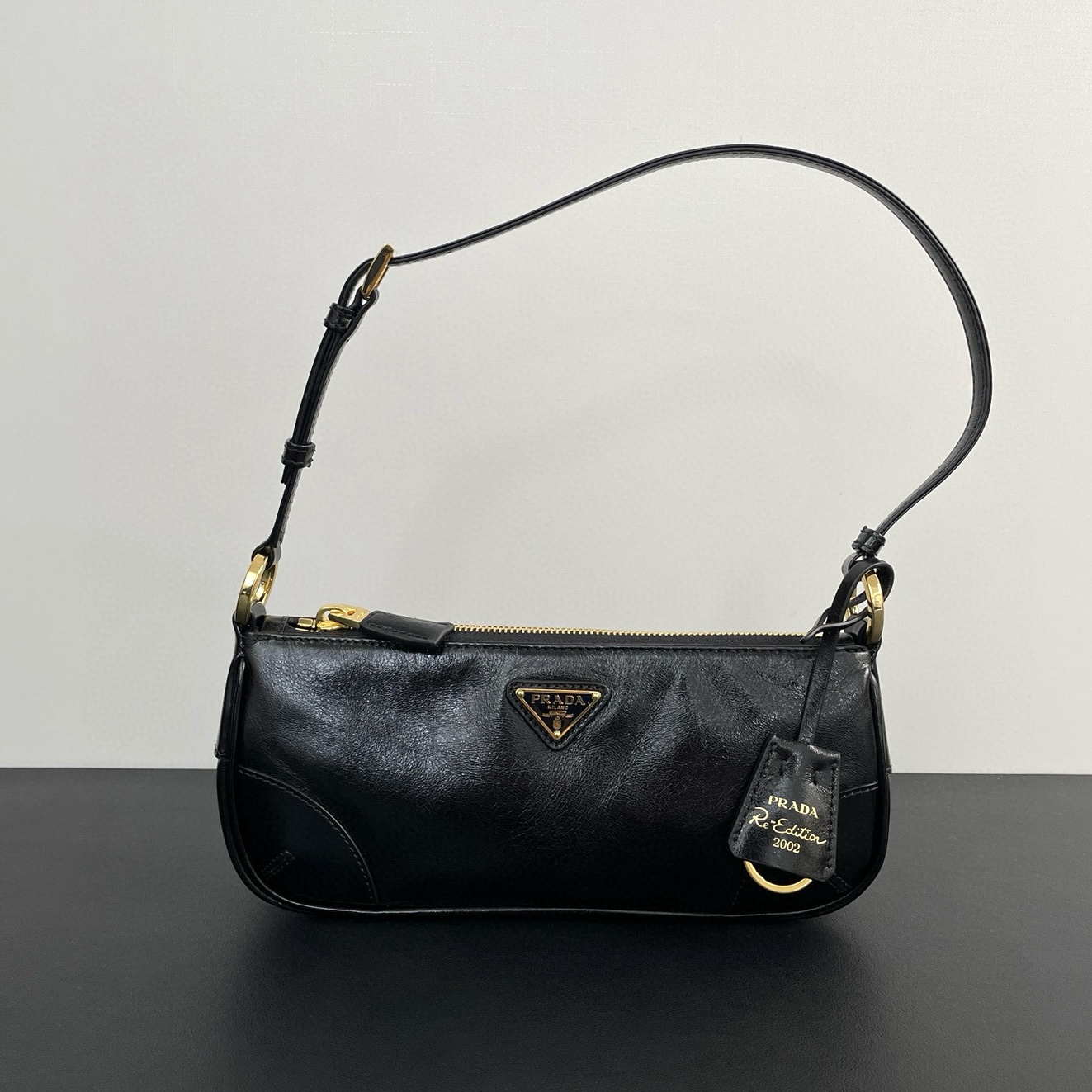 PRADA Re-Edition 2002 small leather shoulder bag Black/Gold Hardware