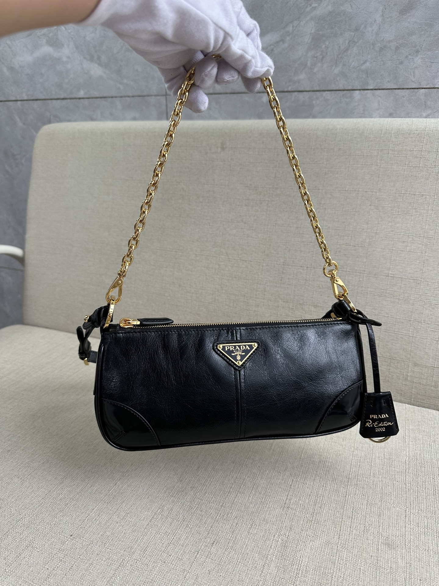 PRADA Re-Edition 2002 medium leather shoulder bag Black/Gold Hardware