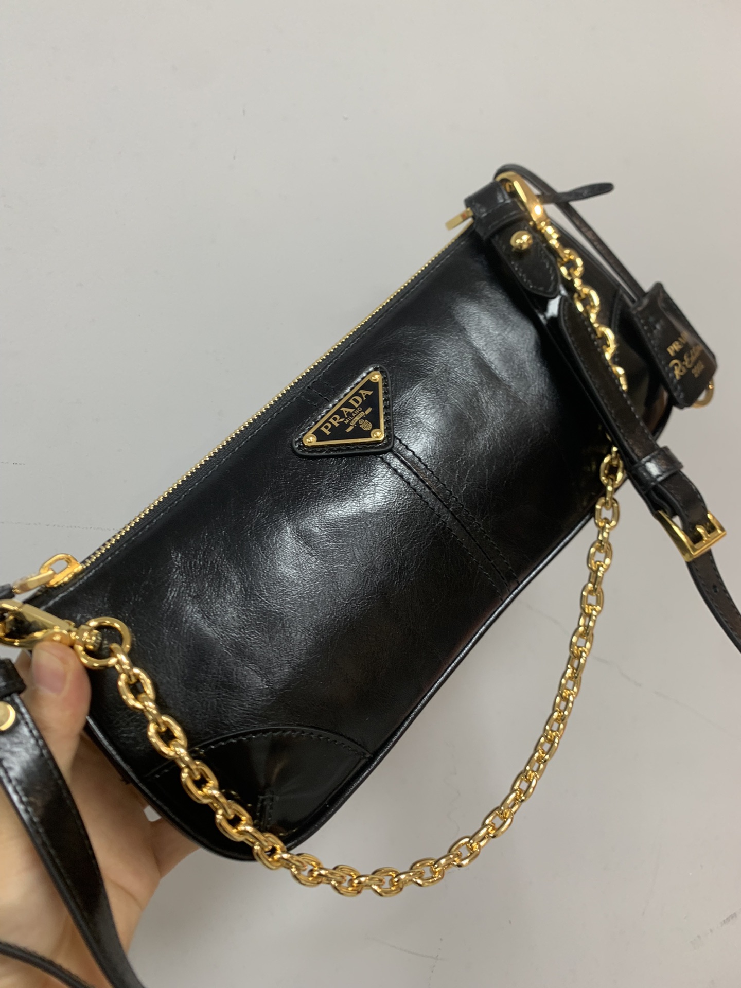 PRADA Re-Edition 2002 medium leather shoulder bag Black/Gold Hardware