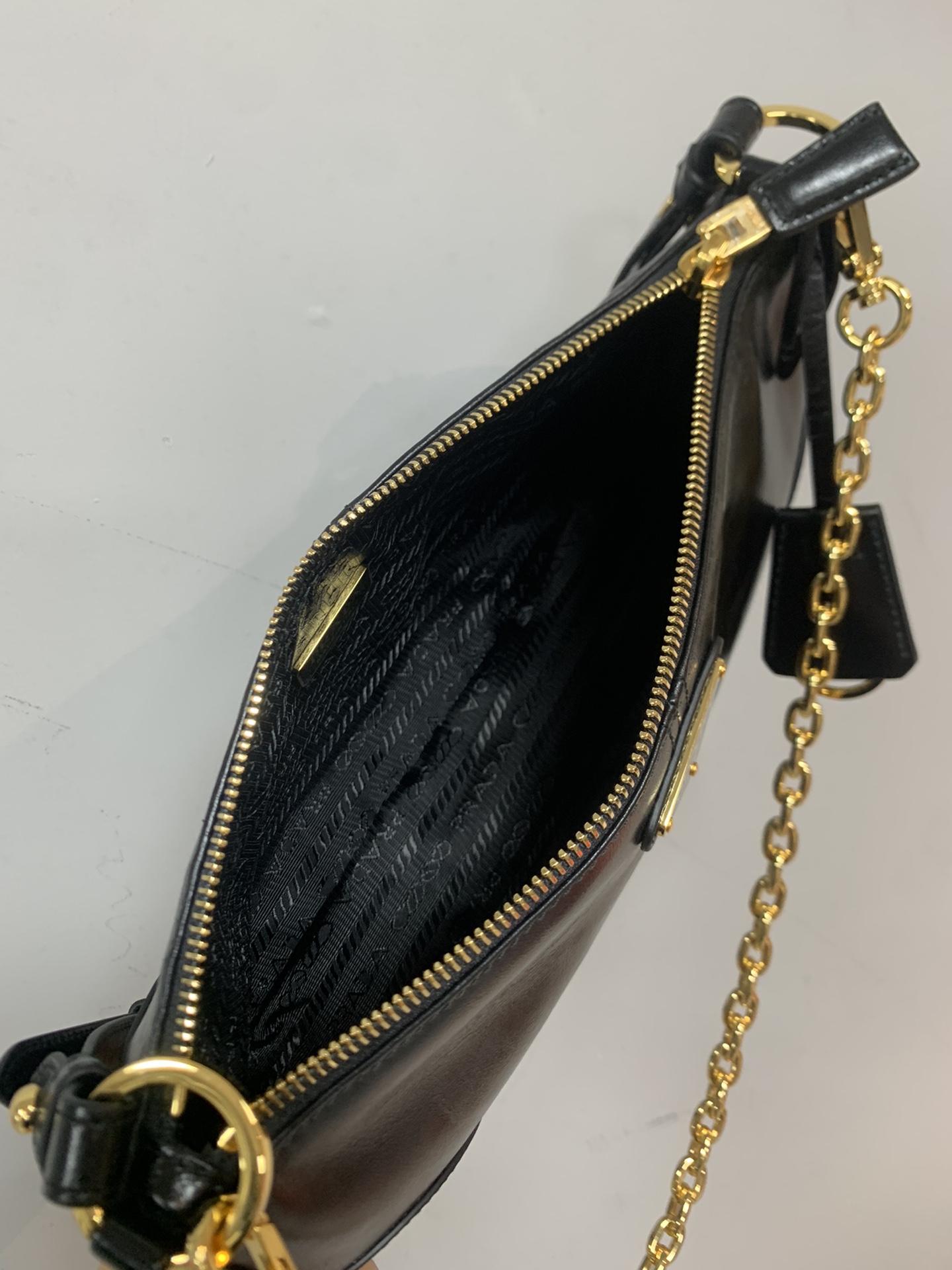 PRADA Re-Edition 2002 medium leather shoulder bag Black/Gold Hardware