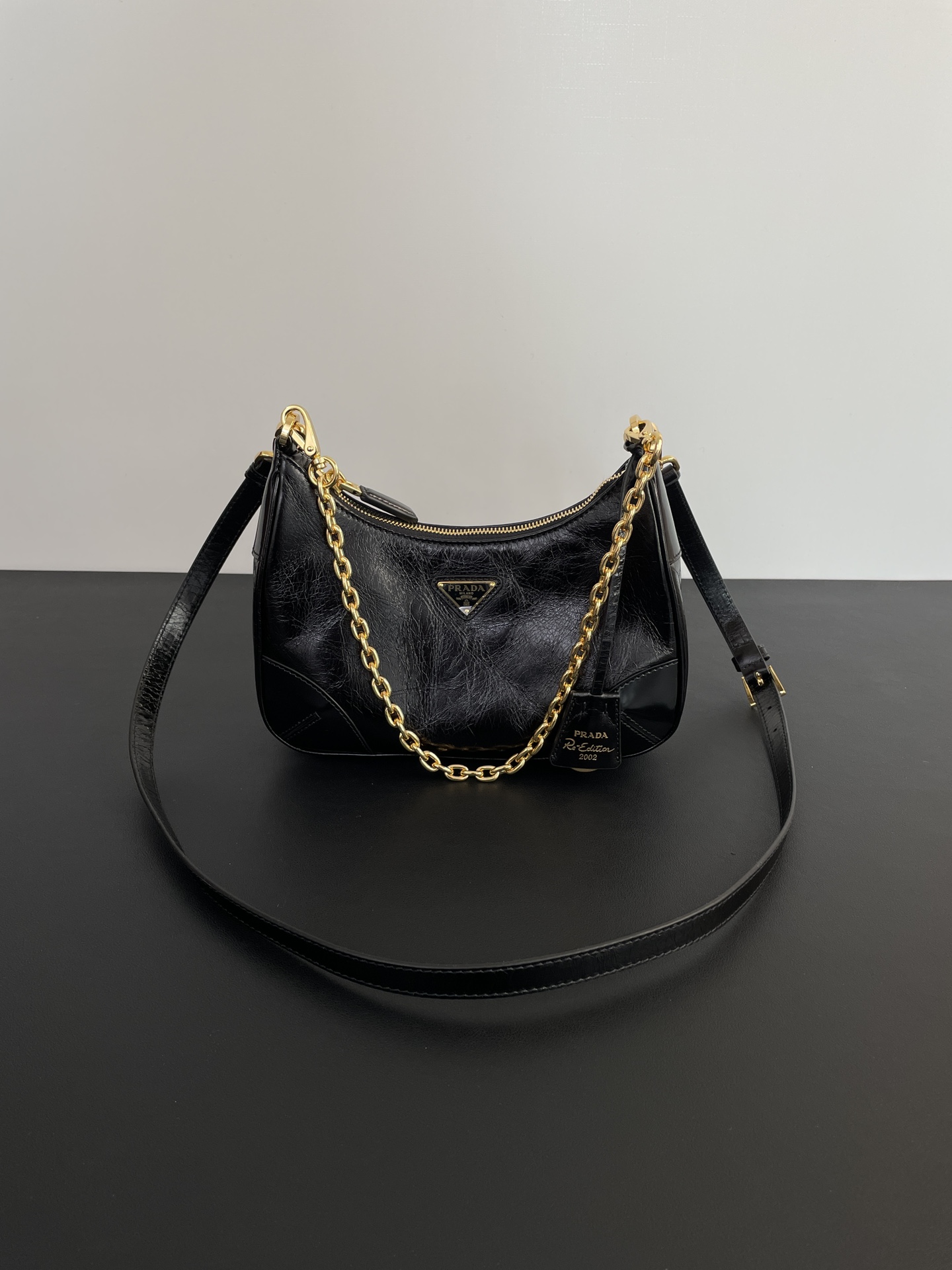 PRADA Re-Edition 2002 leather shoulder bag Black/Gold Hardware