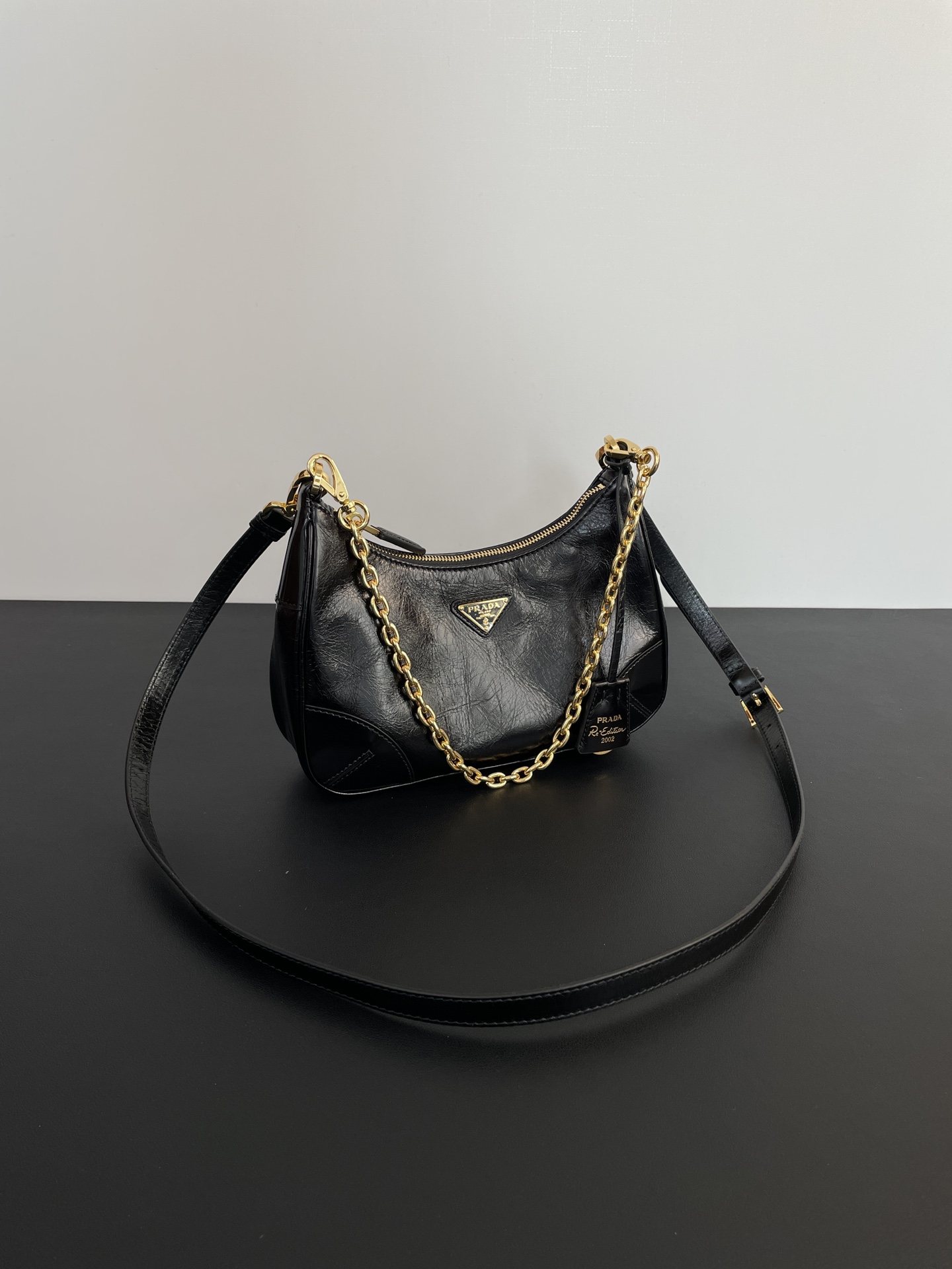 PRADA Re-Edition 2002 leather shoulder bag Black/Gold Hardware