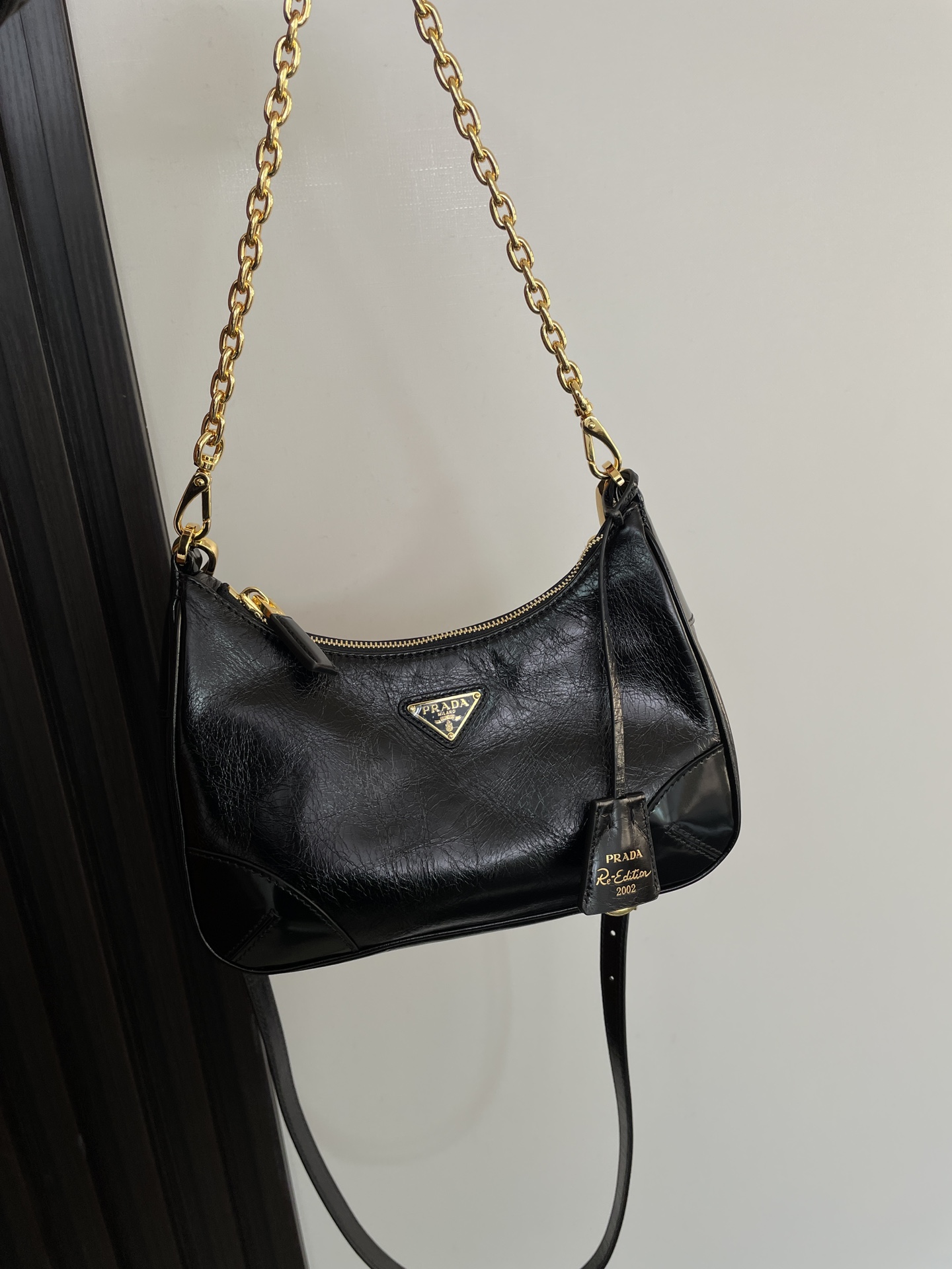 PRADA Re-Edition 2002 leather shoulder bag Black/Gold Hardware