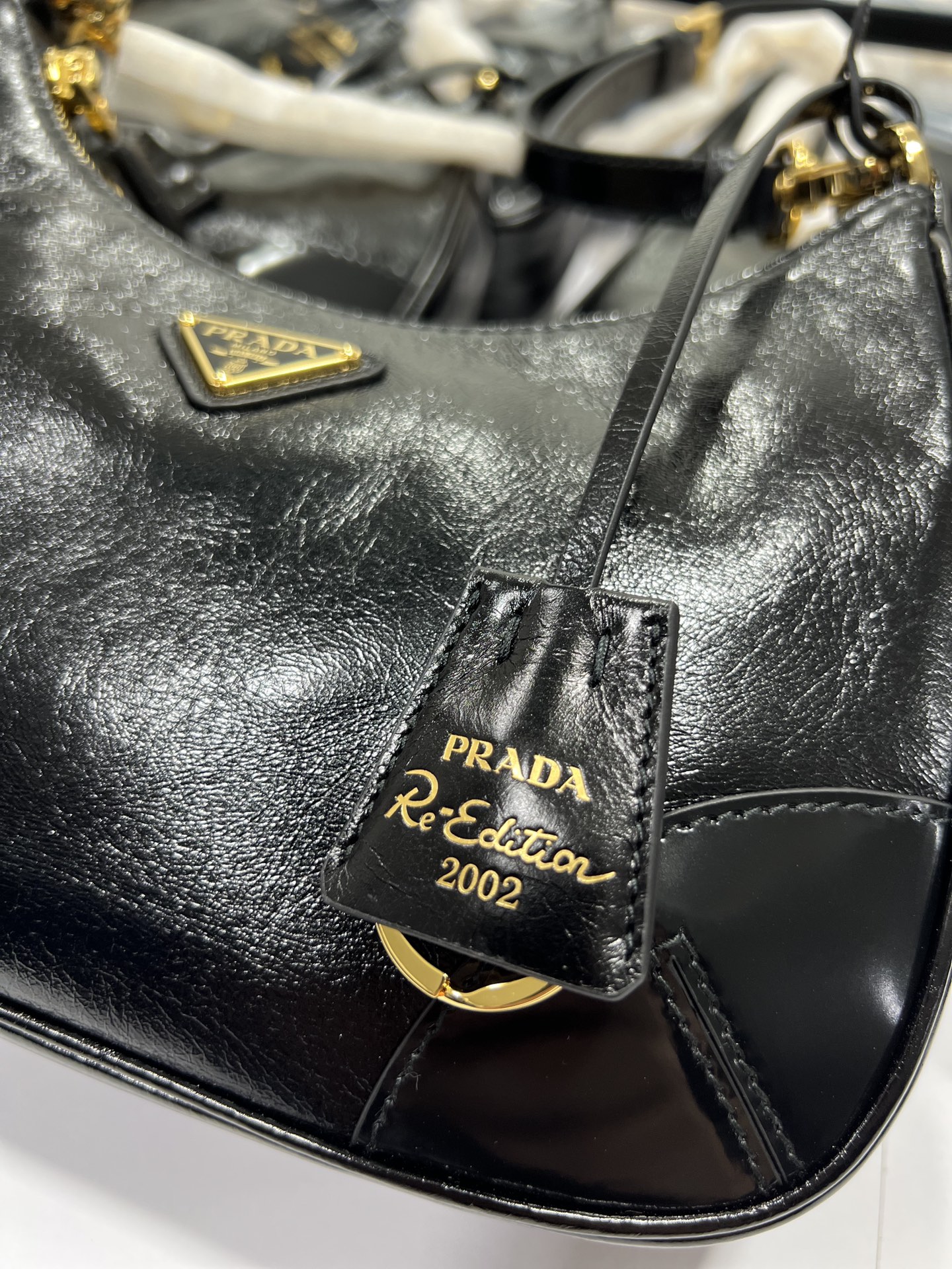 PRADA Re-Edition 2002 leather shoulder bag Black/Gold Hardware