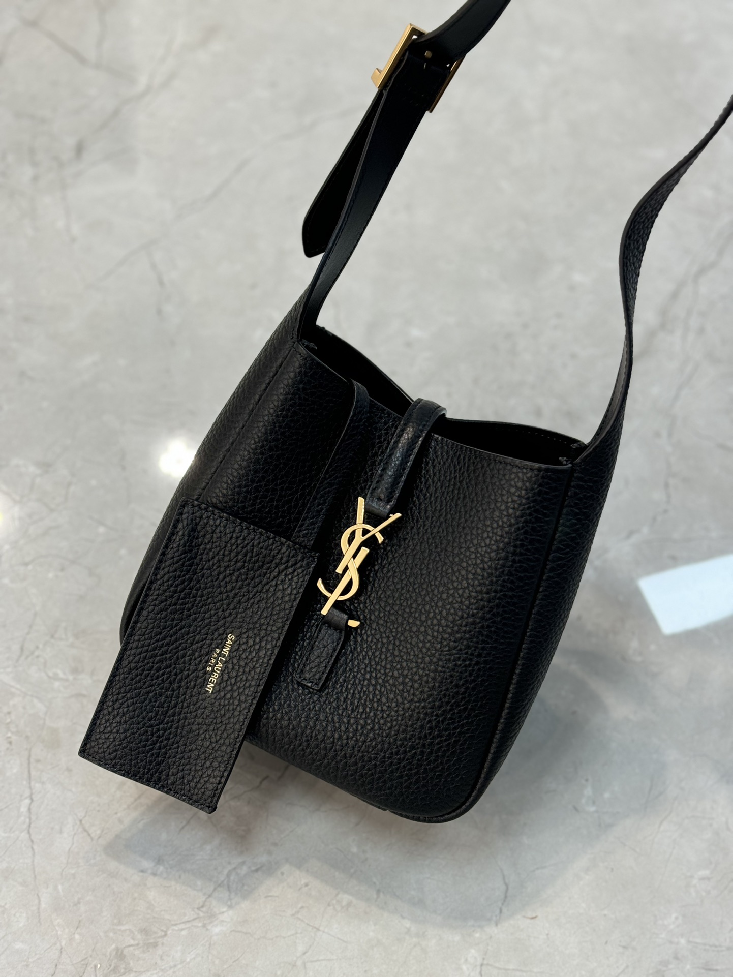 SAINT LAURENT LE 5 À 7 supple baby bag in grained leather Black